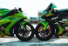 Sportowe 600 kontra nowoczesne 700: test osiągów, elektroniki i codziennej użyteczności Dwa zielone motocykle Kawasaki Ninja ustawione obok siebie na zewnątrz